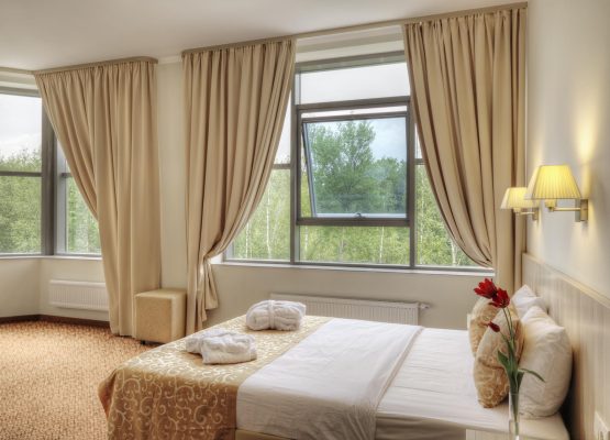 Moscow, Russia, Russia,Bed and curtains in hotel room