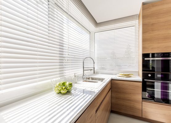 Kitchen with white window blinds